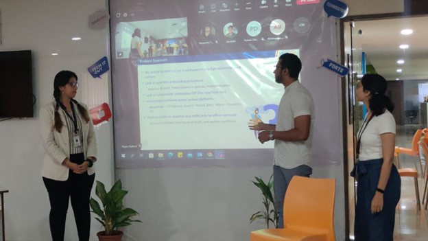 CloudMoyo employees presenting their work during CloudMoyo's first TechFest.