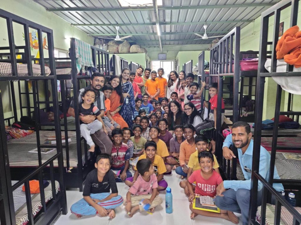 Group picture of CloudMoyo employees with students at Snehwan School in Pune.